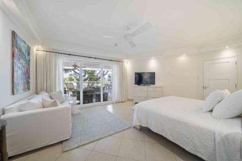 Palm Beach 204 Barbados Beachfront Condo Rental Master Bedroom With Seaview and Seating Area