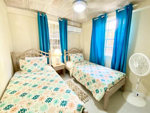 Heywoods 145 Barbados Vacation Rental Apartment Bedroom 2 with 2 Single Beds