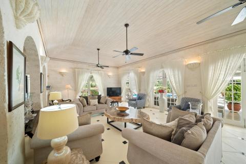 Spacious and elegant living room with comfortable seating and natural light at Ixora, Royal Westmoreland, Barbados