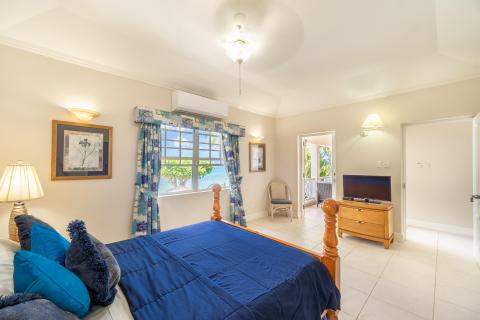Barbados Beachfront Vacation Rental Villa Seawards Master Bedroom towards Patio with TV